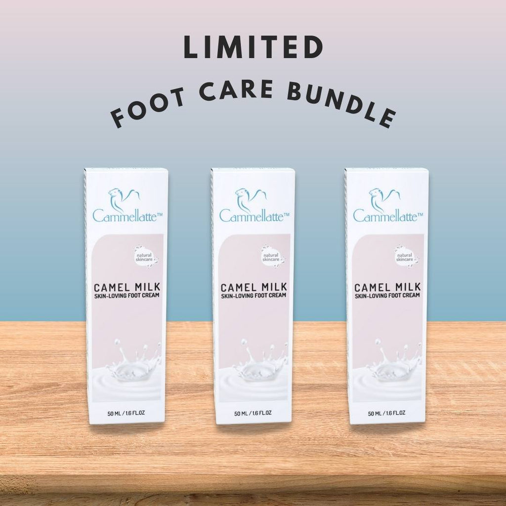 Three boxes of Cammellatte Foot Care Bundle are arranged on a wooden surface with LIMITED FOOT CARE BUNDLE above them on a blue-pink background—perfect for deeply hydrating and soothing dry, cracked feet.