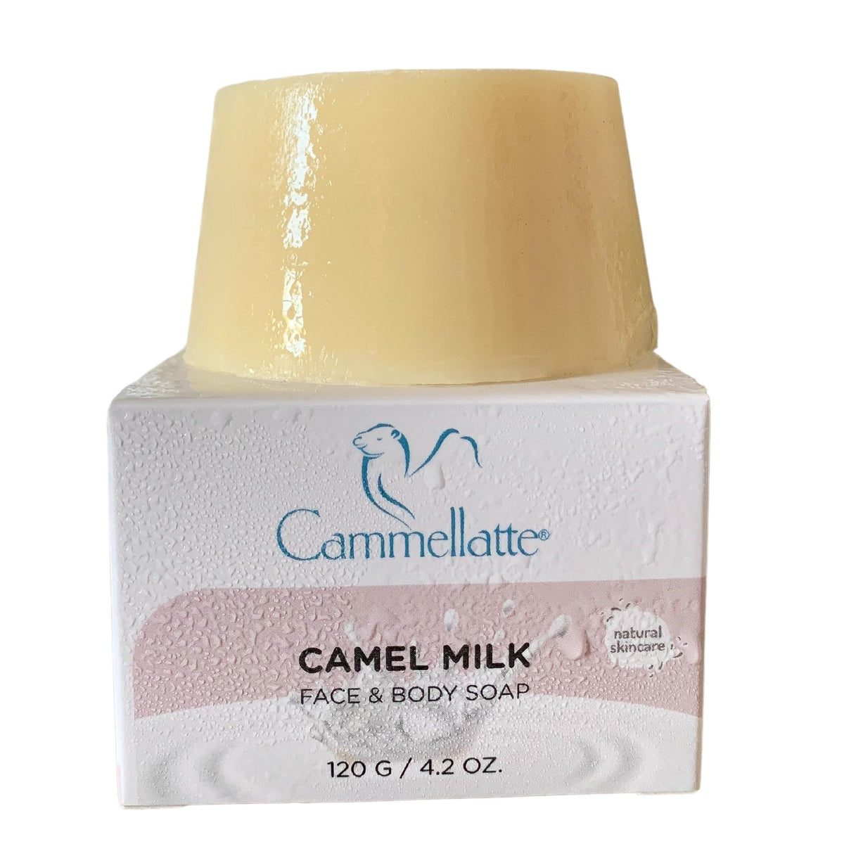 A light yellow bar of Cammellatte Camel Milk Face & Body Soap (2-Pack) rests on a white box with a blue camel logo, “natural skincare,” and 120g/4.2oz label—an ideal alternative to traditional shower gel.